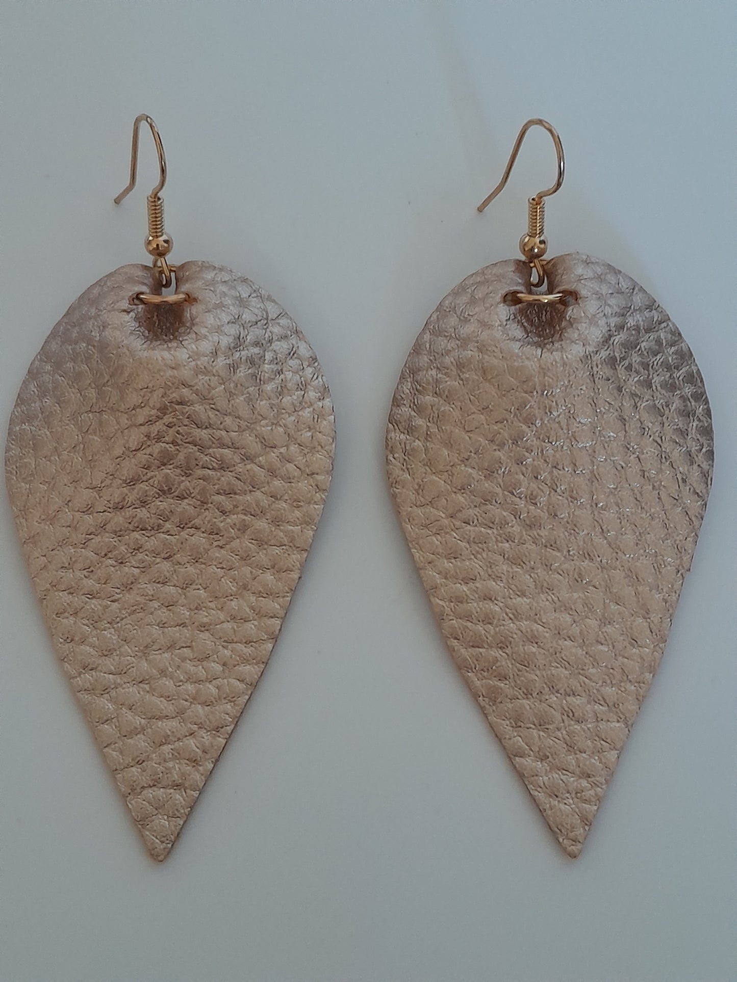 MoUi. Fetching Gold Coloured Faux Leather Leaf Drop