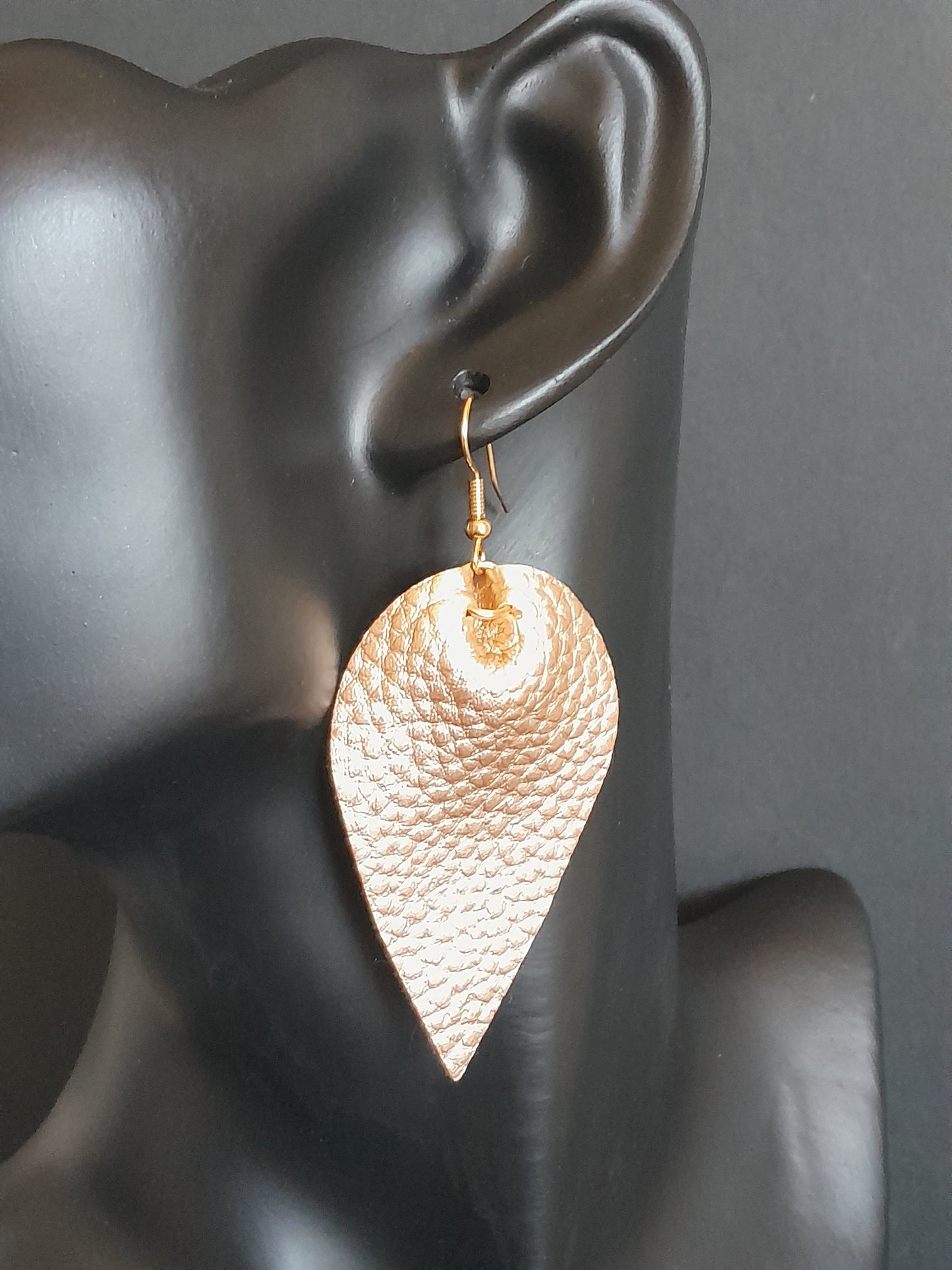 MoUi. Fetching Gold Coloured Faux Leather Leaf Drop